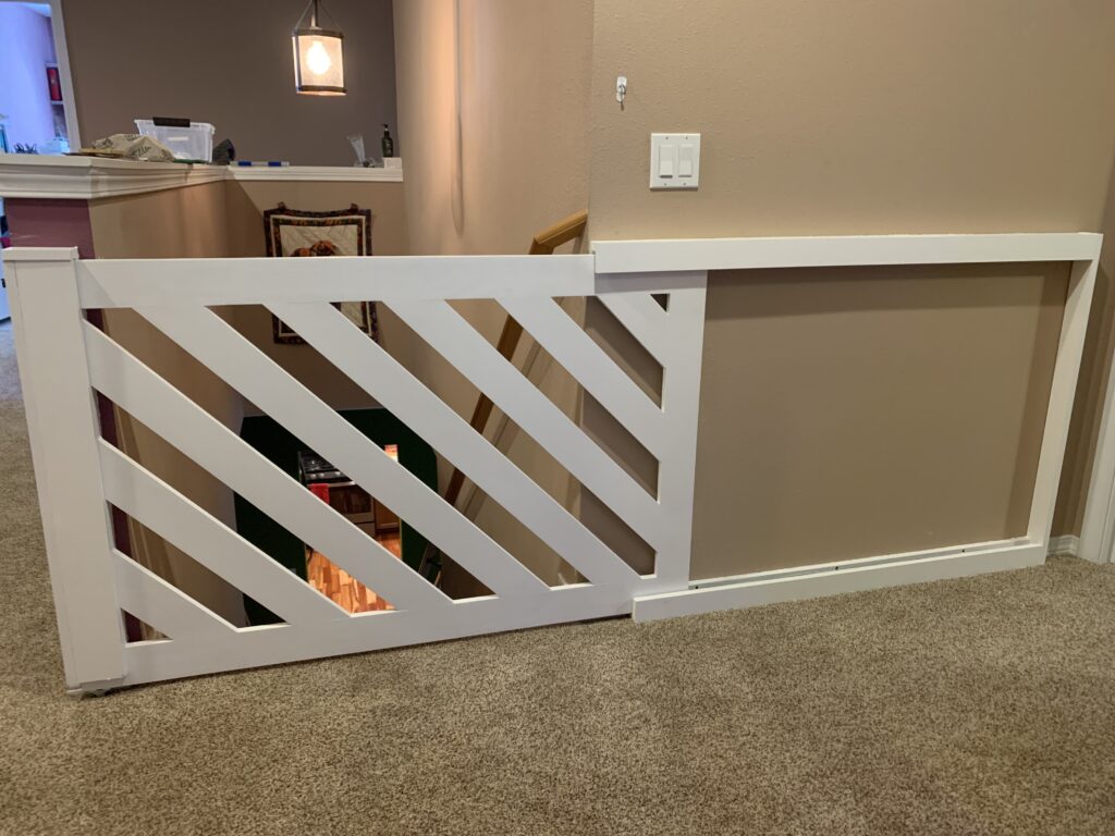 custom baby gate at the top of stairs for Woodgrain Construction portfolio