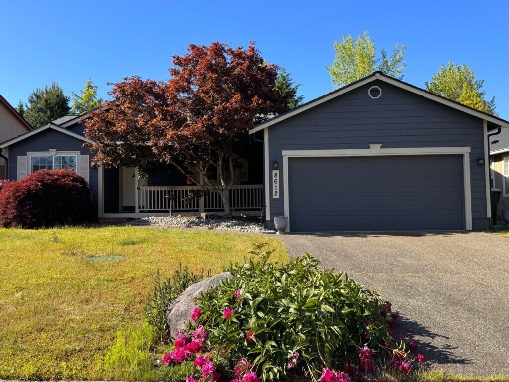 Fresh painted house in Lacey WA. Blue siding with cream trim.