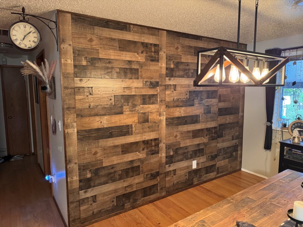 Rustic faux wood accent wall. Dark brown reclaimed wood.